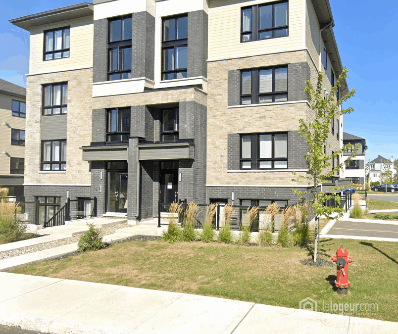 Spacieux 4 ½ à louer – Garage privé, comptoirs de quartz, balcon avec rangement